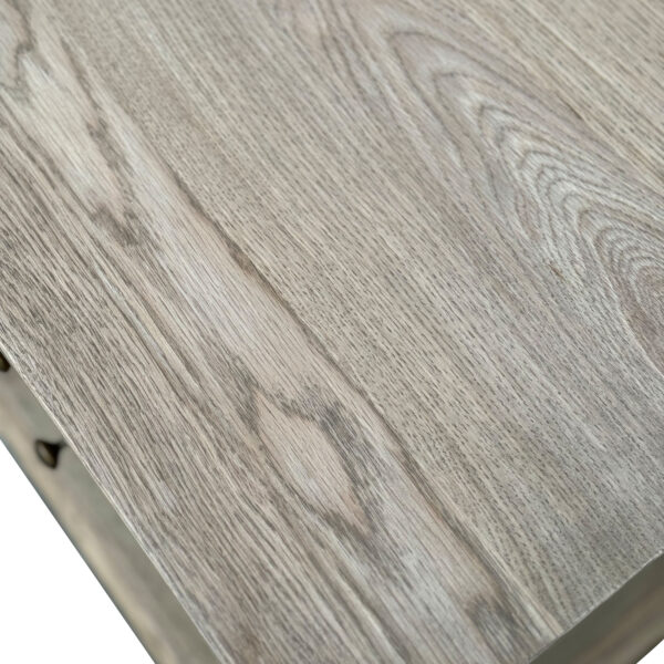 Close-up of a Traditional Antique Style Natural Reclaimed Wood Nightstand Bedside Table Side Cabinet texture with visible grain patterns and drawers.