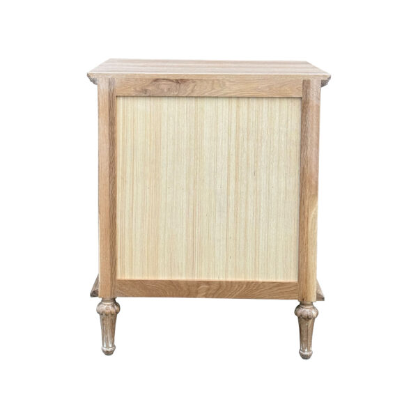 A wide wooden Traditional Antique Style Natural Reclaimed Wood nightstand with an oak finish and turned legs, featuring a single beige panel door and drawers. Isolated on a white background.