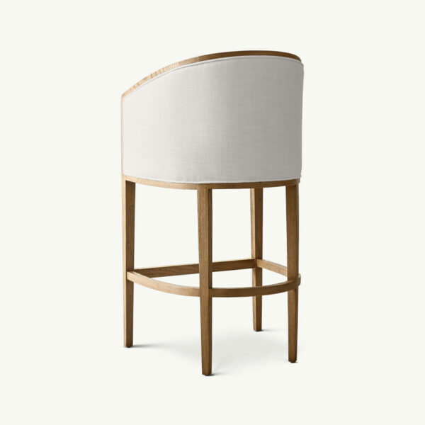 The Classical Bar Stool has a curved white backrest, light wood legs, and a linen fabric seat cushion for comfort.