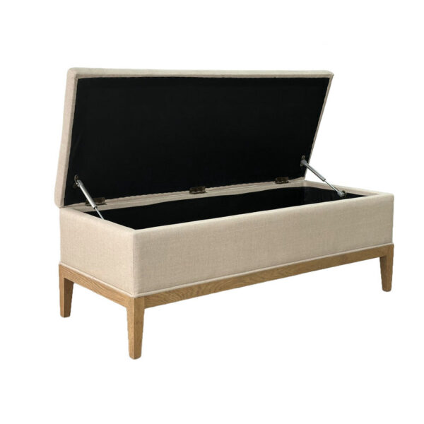 The Nordic Luxury Wood Frame Upholstered Bench features beige upholstery, a black-lined compartment, solid wood legs, and elegant hinges.