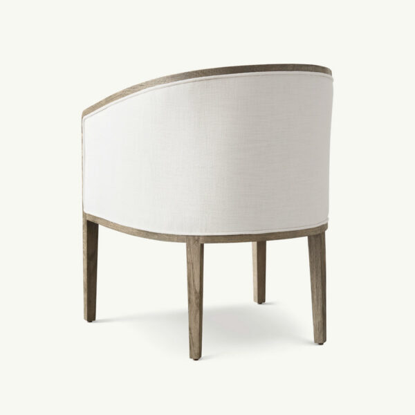 Back view of a modern beige fabric armchair with a curved wooden frame and four legs, designed for any living space.