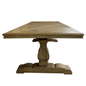 Antique French-style solid wood outdoor picnic table with rectangular top and central pedestal base, end view.