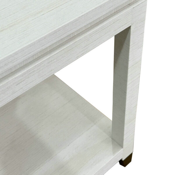 Close-up of a Modern Solid Oak Minimal Bedside Table for living rooms, featuring a rectangular leg and a lower shelf.