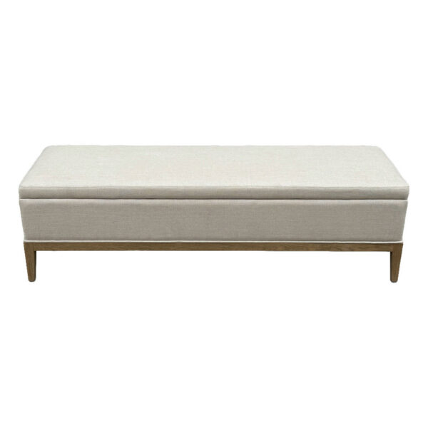 This linen ottoman with a wooden base is perfect as a stylish footrest or for changing shoes.