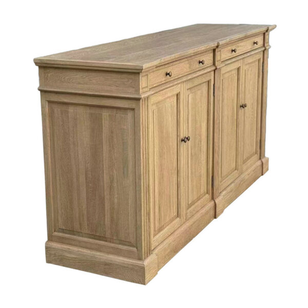 The Antique French Oak Cupboard features a natural finish, 4 cabinet doors, and 3 drawers. It exudes timeless elegance and charm.