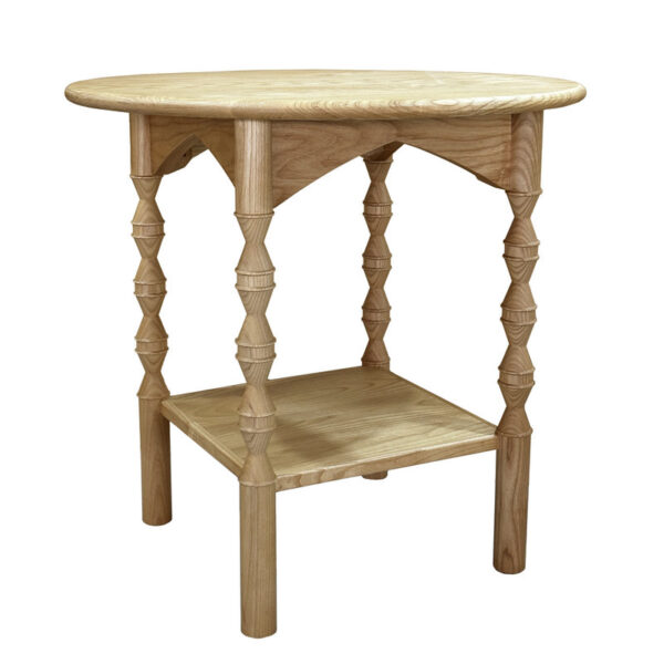 A wooden side table with a round top, hourglass legs, and a lower shelf complements an oak rectangular coffee table.