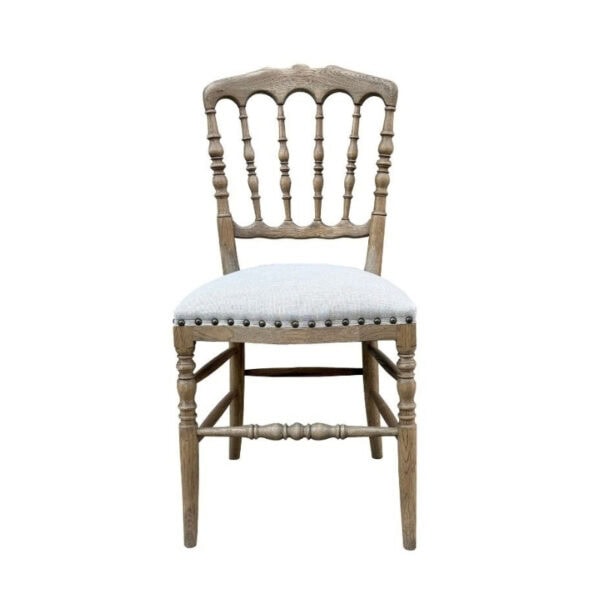 Elegant antique-style solid wood Napoleon III dining chair with linen fabric upholstery and intricate carved details. Perfect for luxury dining rooms and vintage interior decor.