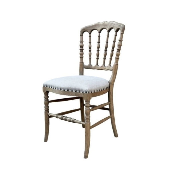 Elegant antique-style solid wood Napoleon III dining chair with linen upholstery and intricate carved details. Perfect for luxurious dining rooms and vintage interior decor.
