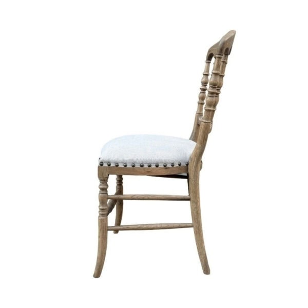 Antique style solid wood Napoleon III dining chair with linen fabric upholstery, elegant carved details, and a luxurious design perfect for classic dining rooms.