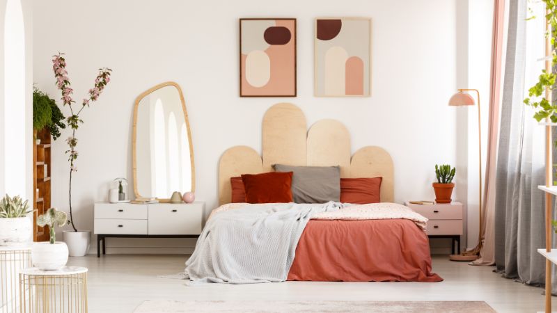 Stylish Modern Bedroom with Cozy Decor, Bohemian-Inspired Bed Setup.