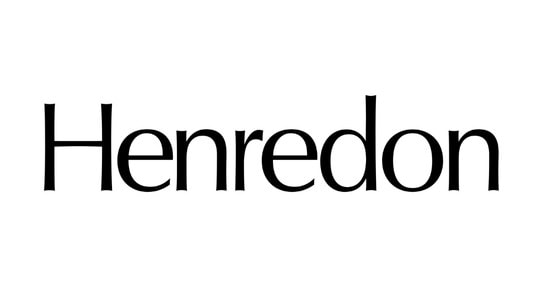 Logo of Henredon, a renowned vintage furniture manufacturer known for high-quality craftsmanship and timeless designs.