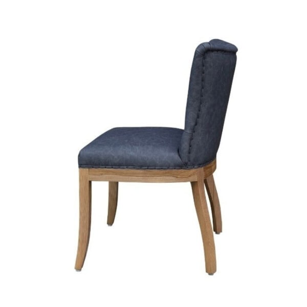 Elegant French style dining chair with solid ash wood frame, tufted leather upholstery, and comfortable cushioning, perfect for luxury dining rooms.