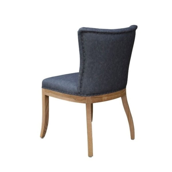 Elegant French style dining chair with solid ash wood frame and tufted leather upholstery, perfect for luxurious dining rooms. Combines classic design with durable craftsmanship.