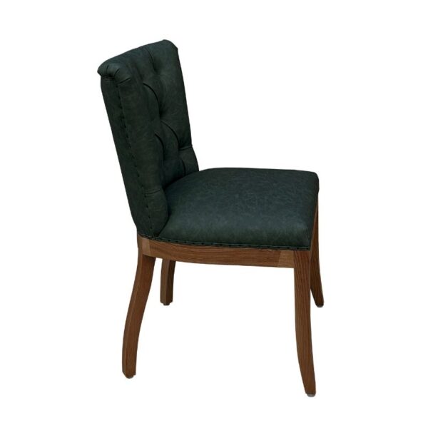Stylish dark green dining chair featuring a plush upholstered seat and backrest, supported by a sturdy ash wood frame, perfect for modern and luxurious dining spaces.