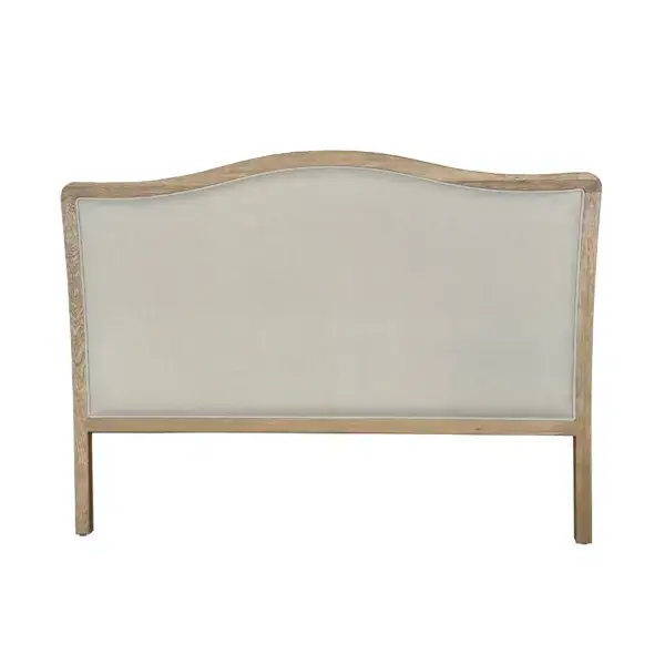 Vintage carved wooden frame with upholstered fabric, French country style king headboard, elegant and classic design for luxurious bedroom decor.