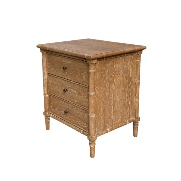 Wooden bedside table with three drawers, perfect for bedroom storage and decor. Crafted from natural wood, it offers functional and stylish bedside organization.