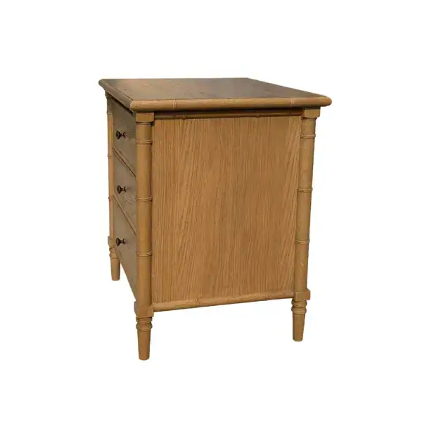 Elegant wooden bedside table featuring three spacious drawers for bedroom storage. Crafted from high-quality wood, perfect for bedside or living room use.
