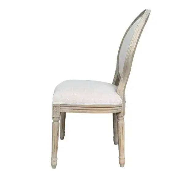 Elegant French antique style oval back dining chair with distressed wood finish and upholstered seat, perfect for classic and vintage-inspired dining rooms.