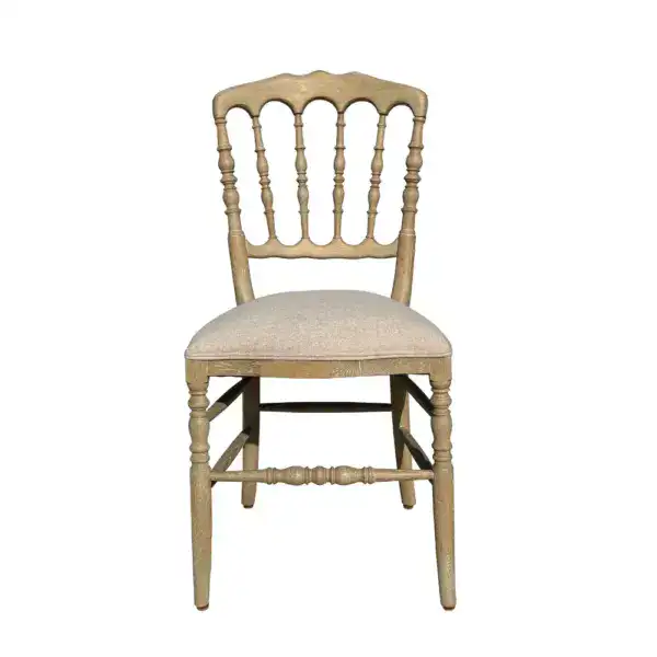 Antique style solid oak wood Regency dining chair with a cushioned seat and ornate spindle backrest, perfect for classic dining rooms and vintage interior decor.