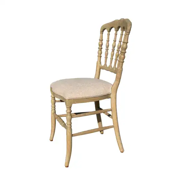 Antique style solid oak wood Regency dining chair with a cushioned beige seat and classic spindle back design, perfect for traditional dining rooms.