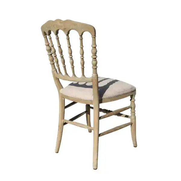 Antique solid oak Regency style dining chair with carved backrest and cushioned seat, perfect for vintage or classic dining room decor. Crafted from durable oak wood with elegant design details.