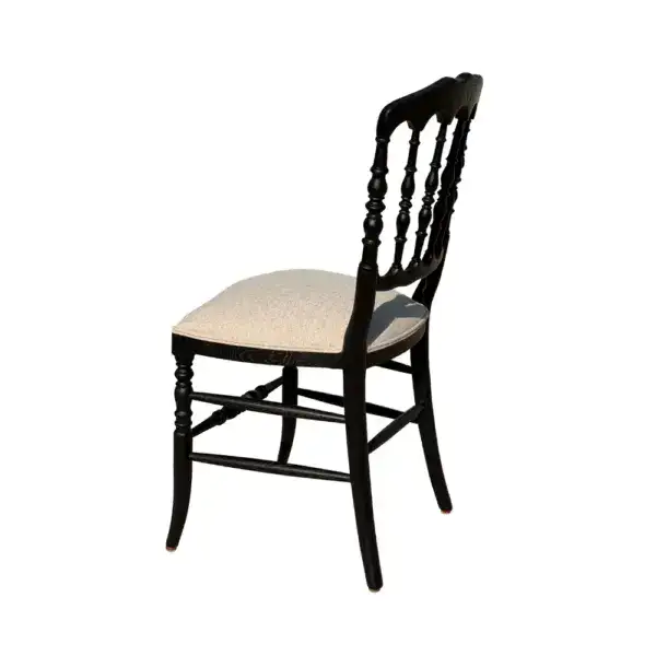 Antique style solid oak wood Regency dining chair with a cushioned beige seat and classic spindle back design. Perfect for traditional dining rooms, combining elegance and durability.