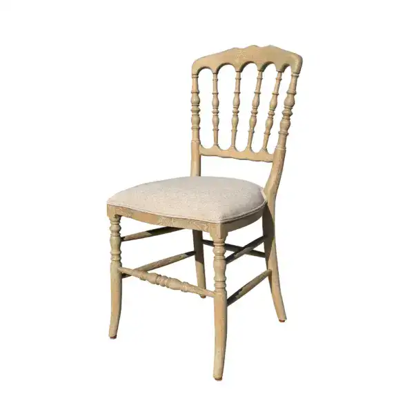 Elegant antique style solid oak wood Regency dining chair with a cushioned seat and classic spindle back design. Perfect for vintage or traditional dining room decor.