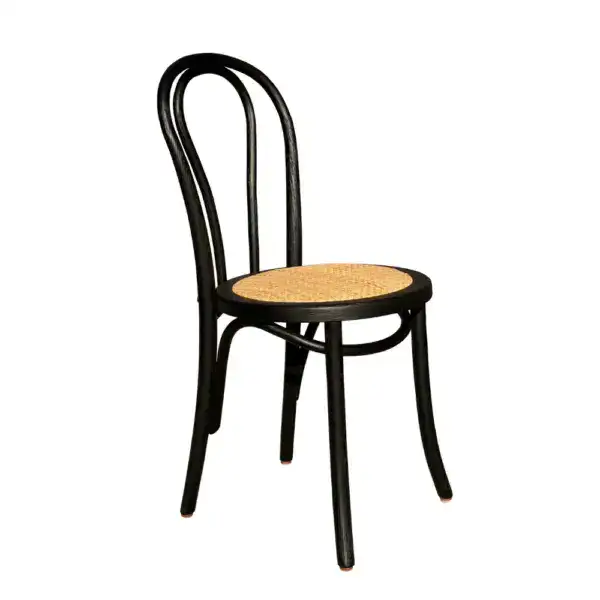 Elegant vintage French-style dining chair with a black bentwood frame and a woven rattan seat, perfect for classic and rustic interior decor.