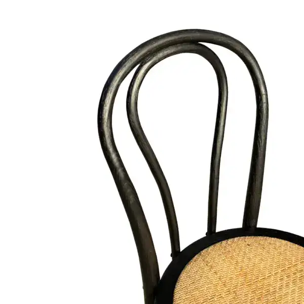 Elegant vintage French style rattan and bentwood dining chair with curved backrest and woven seat, perfect for classic and rustic interior decor.