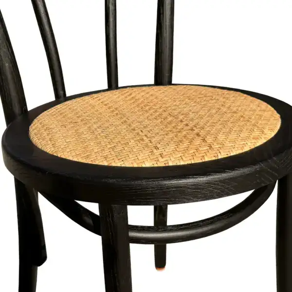 Elegant vintage French style rattan seat with black bentwood frame, perfect for classic dining rooms or stylish interiors. Crafted with high-quality materials for durability and timeless appeal.