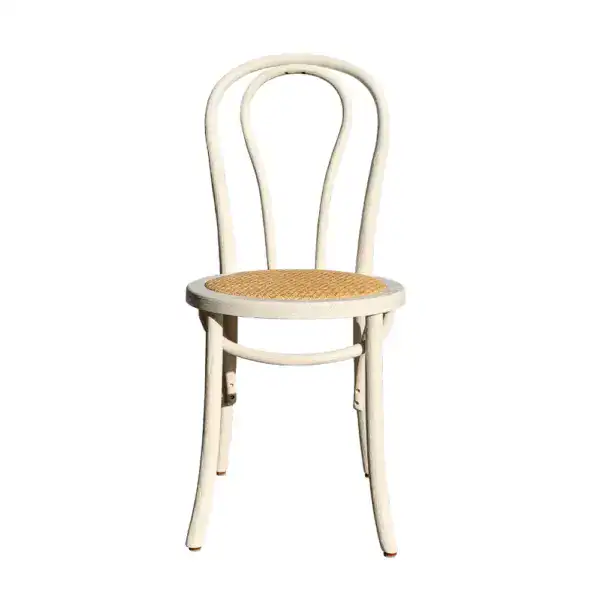 Elegant vintage French-style rattan and bentwood dining chair with a woven seat, perfect for classic and rustic interior decor.