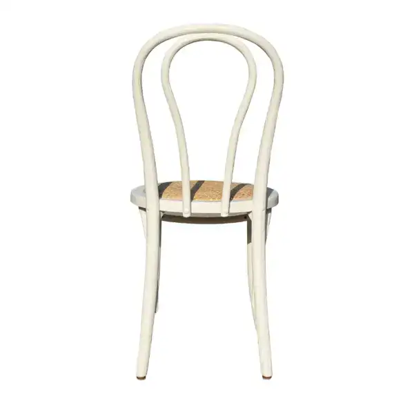 Vintage French style rattan and bentwood dining chair with elegant curved backrest and woven seat, perfect for classic and rustic interior decor.