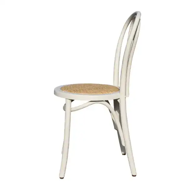 Vintage French style bentwood dining chair with rattan seat, elegant curved backrest, and classic design perfect for vintage or French-inspired interiors.